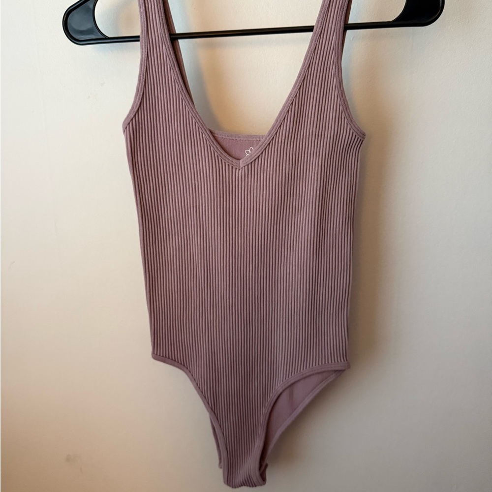 Aura Purple Bodysuit with V-Neck and High-Cut Leg